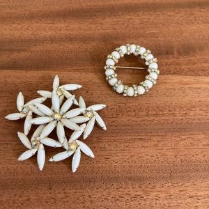 Two Vintage milk glass and iridescent rhinestone brooches